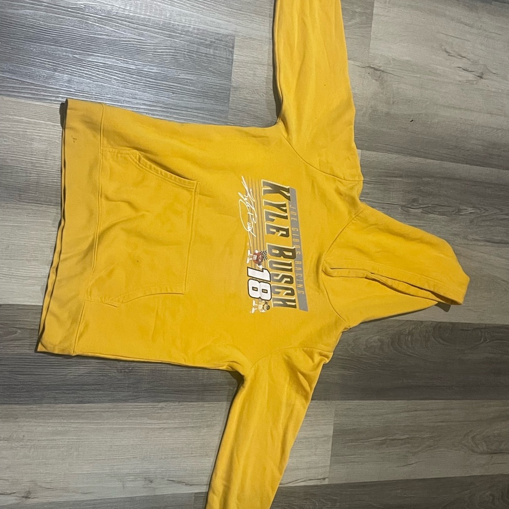 Vibrant Yellow Pullover Jacket with Graphic Design